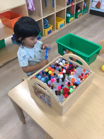 Child playing with art supplies